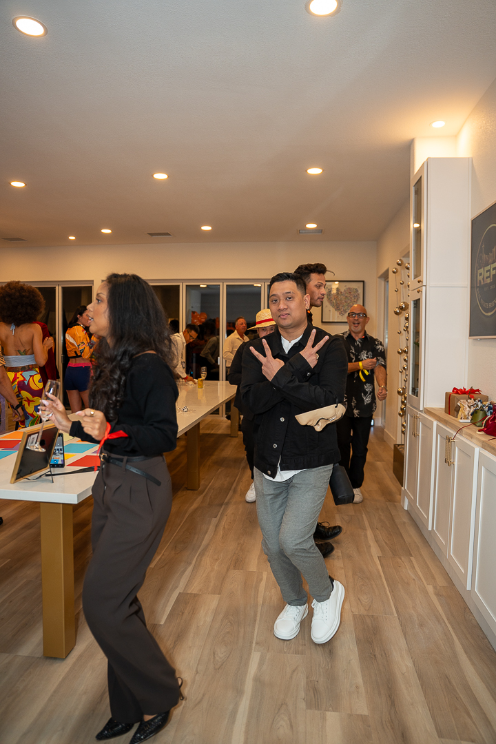 Two friends dancing together at the REFC Halloween Mixer