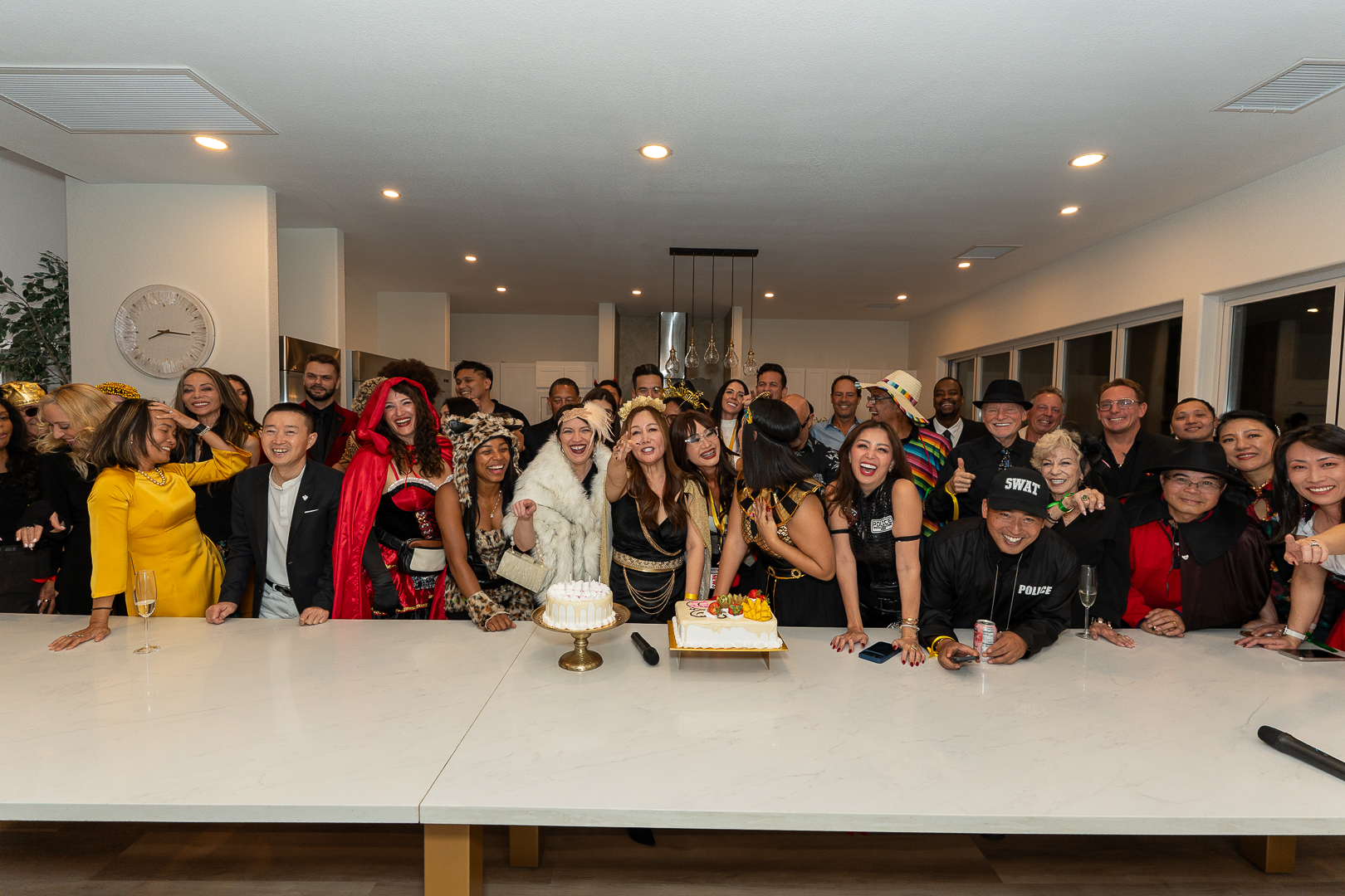 The REFC group gathered around the cake for the club's first anniversary