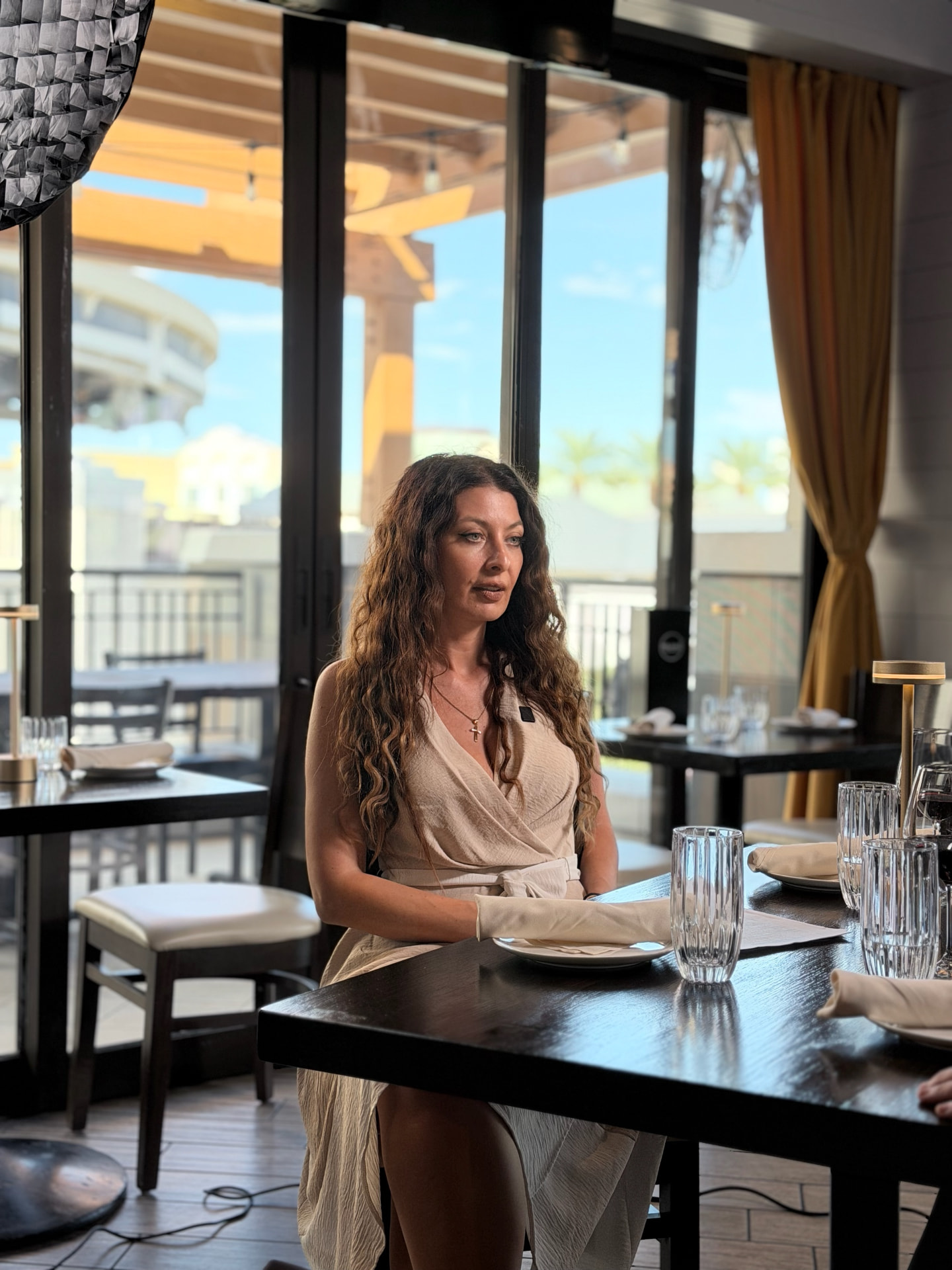 Catalina Magee at the table during the Milano feature