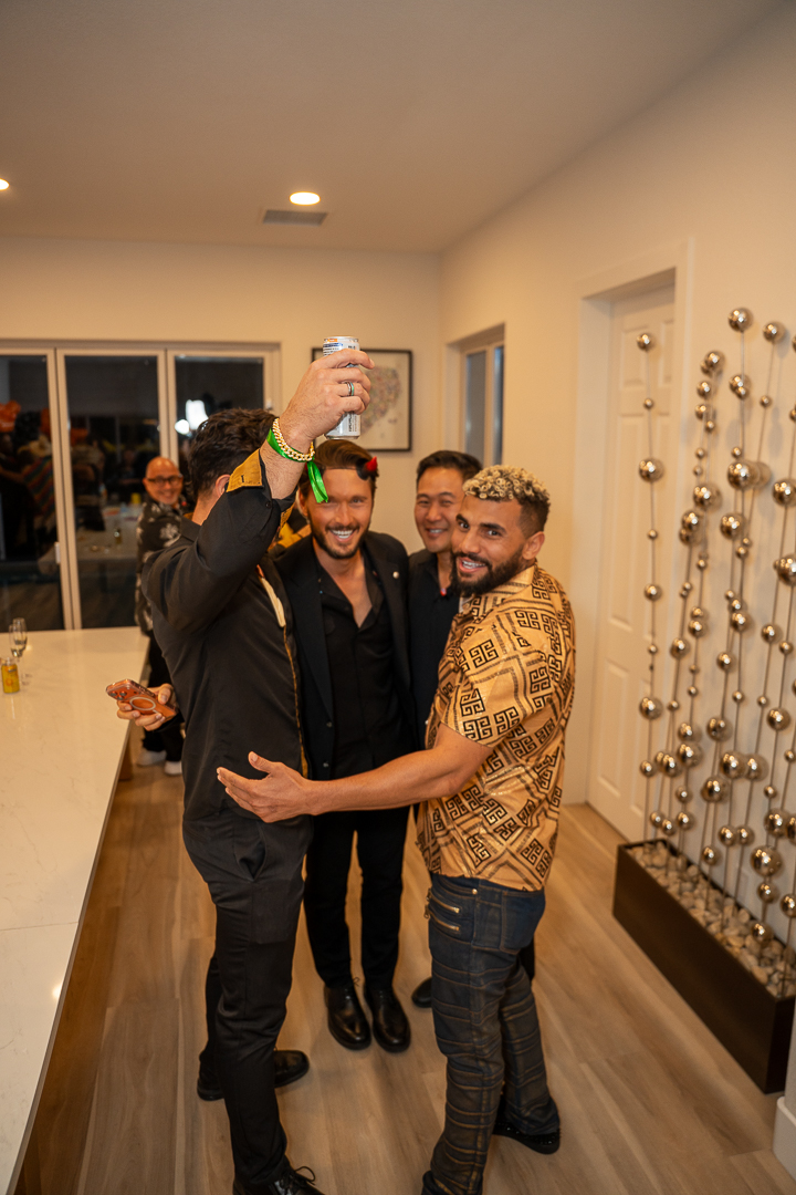 Friends posing for a selfie during the REFC celebration