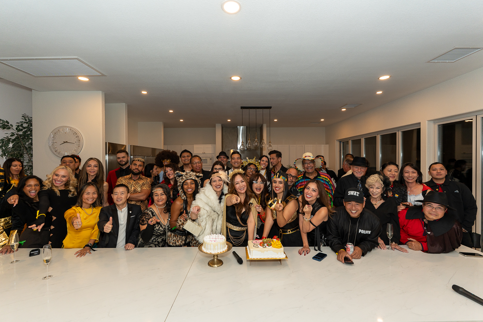 The whole REFC group gathered around the cake for the club's first year